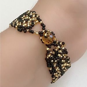 Thin gold & black bracelet